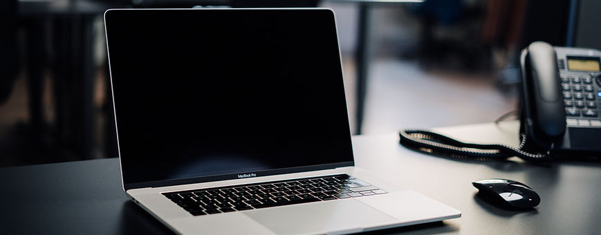 A laptop on a writer’s desk